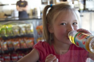 Little Girl Drinking Apple Juice